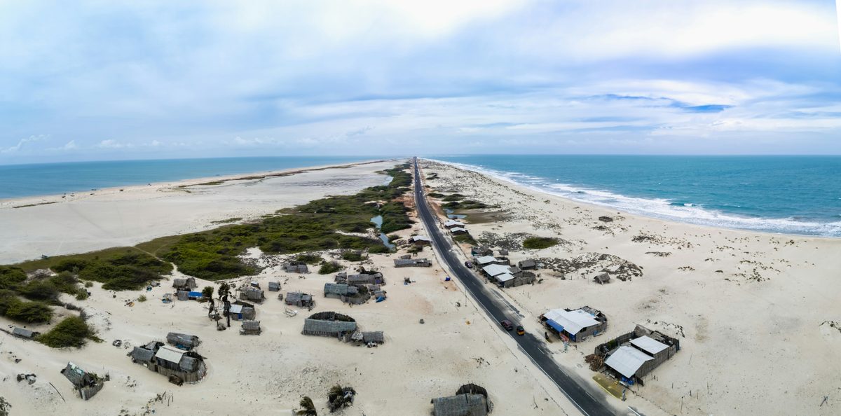 The narrow Dhanushkodi road running out to sea with water on both sides, near Rameswaram